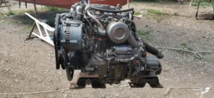Full side view of a Yanmar 3GM30FC marine diesel engine used for technical comparison.